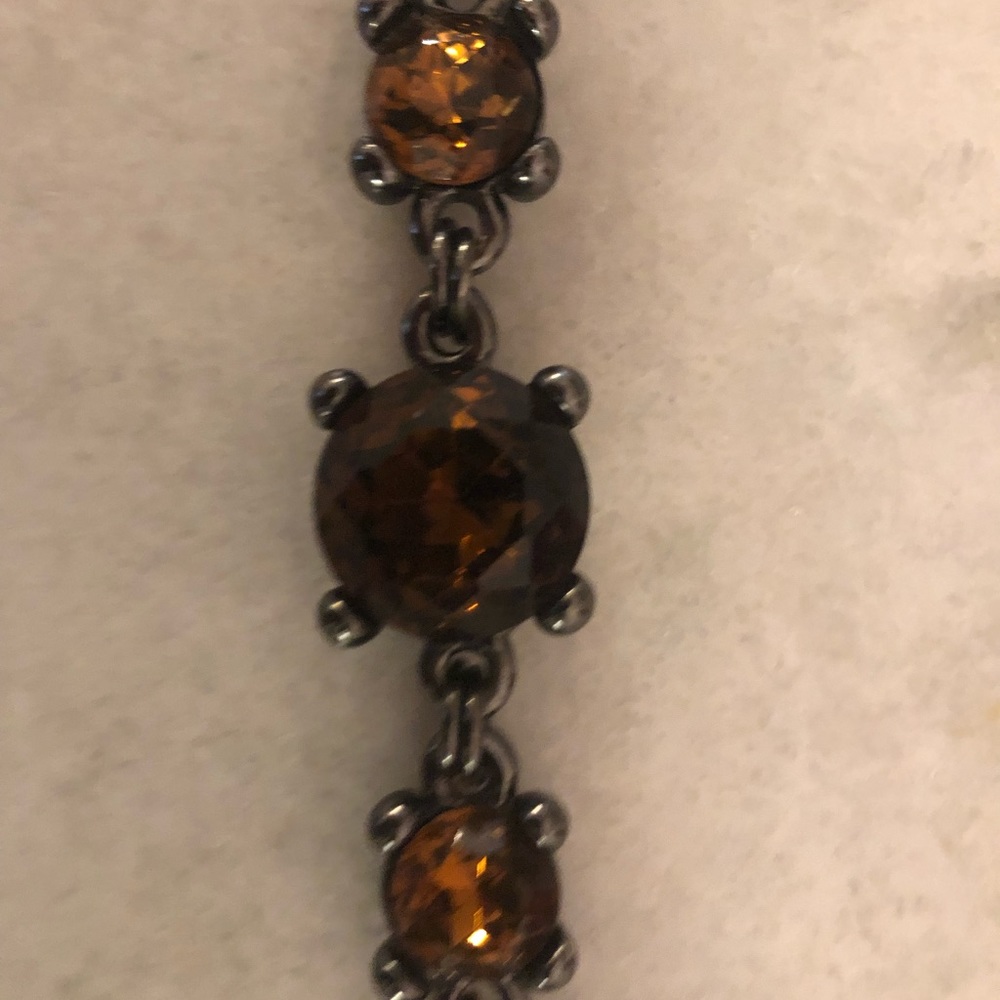 Gun metal bracelet with dark brown stones